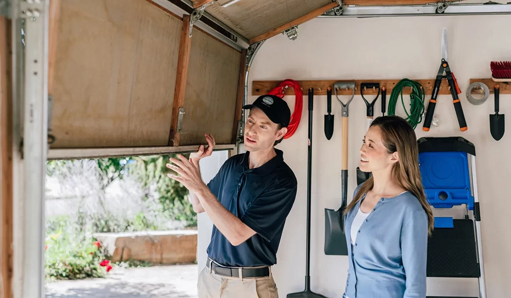 Technician performing garage door repair in San Antonio, ensuring convenience, safety, and security for homes and businesses.